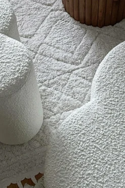 Pastill Puffer & Fodskamler-Bodhi puf i bouclé ø 70 cm